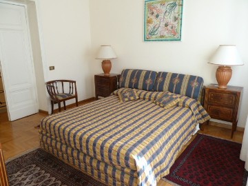 master bedroom of the Borghese Gardens Parioli villa